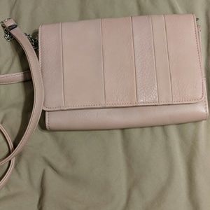 Light pink wallet on a chain